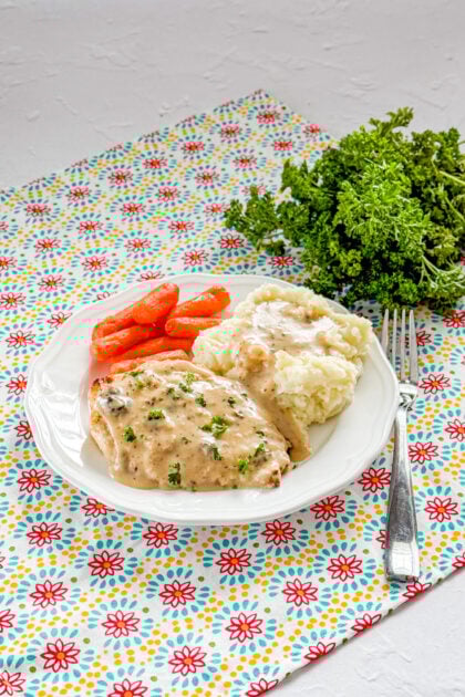 Oven baked buttermilk chicken with gravy served with mashed potatoes