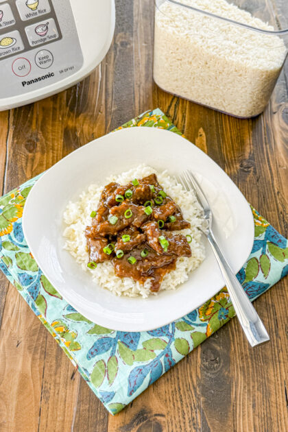 Homemade Mongolian beef served over white rice for an easy takeout-style dinner