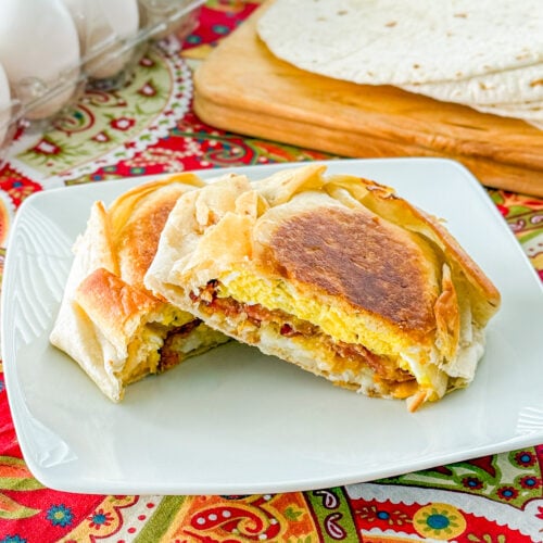 Breakfast crunchwrap with eggs, bacon, cheese, and hash browns toasted until golden brown