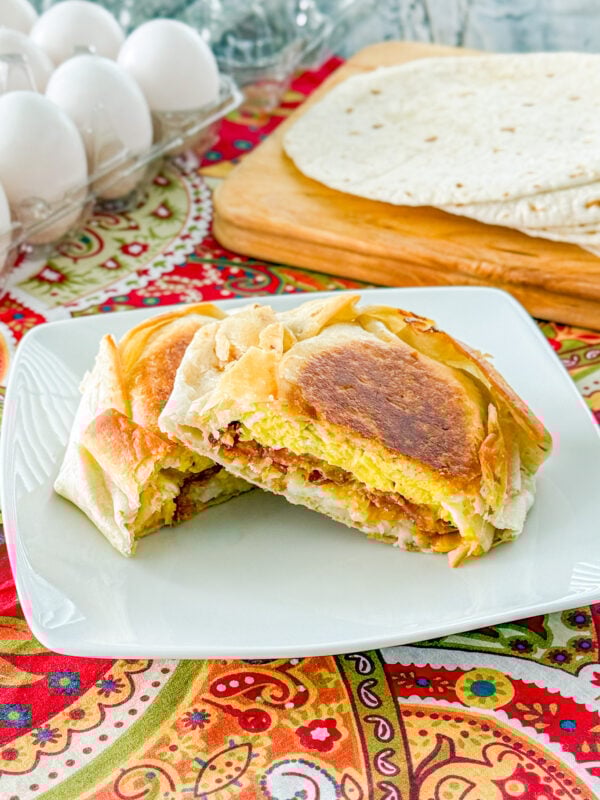 Homemade Taco Bell copycat breakfast crunchwrap with eggs, bacon, cheese, and hash browns