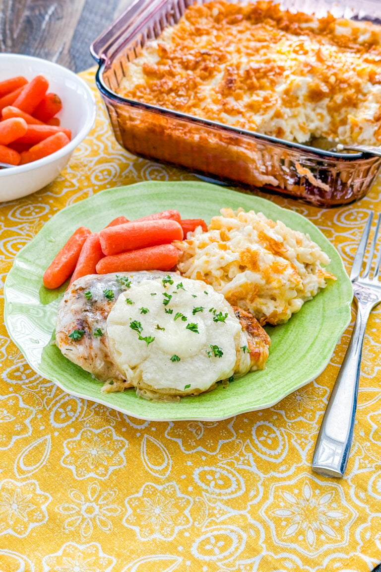 Easy baked pineapple chicken topped with melted cheese and pineapple rings