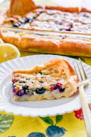 Lemon blueberry Dutch baby pancake topped with fresh blueberries