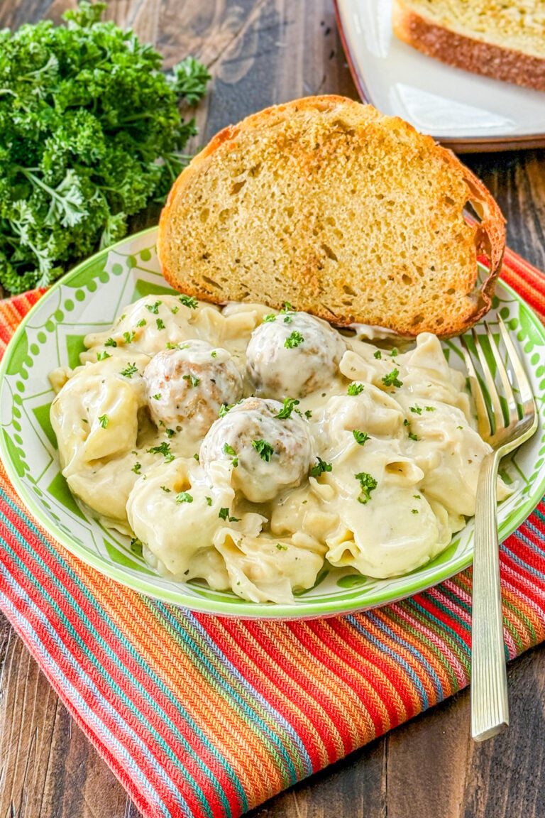 Slow cooker creamy meatballs with tortellini in a creamy sauce
