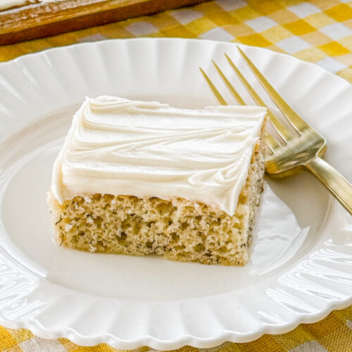 Close-up of banana bars topped with cream cheese frosting