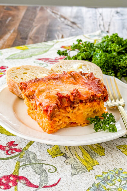 Friendship spaghetti pie baked with meat sauce, ricotta, and melted mozzarella cheese