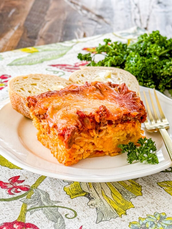 Friendship spaghetti pie baked with meat sauce, ricotta, and melted mozzarella cheese
