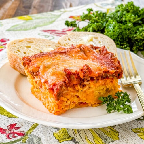 Layer ricotta and meat sauce over spaghetti for friendship spaghetti pie