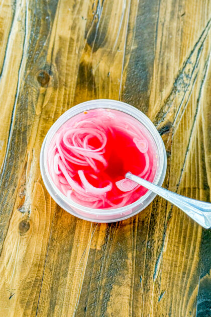 No boil quick pickled red onions ready to use as a topping