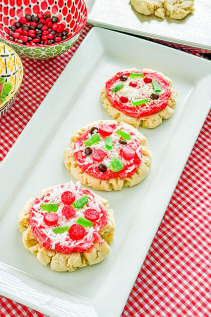Mini sugar cookie decorated to look like a sweet pizza