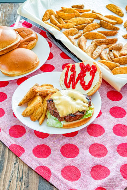 Glazed cola cheeseburger with melted cheese and fresh burger toppings
