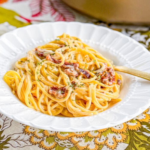 creamy sun-dried tomato pasta made with pasta, sun-dried tomatoes, garlic, cream cheese, and Parmesan