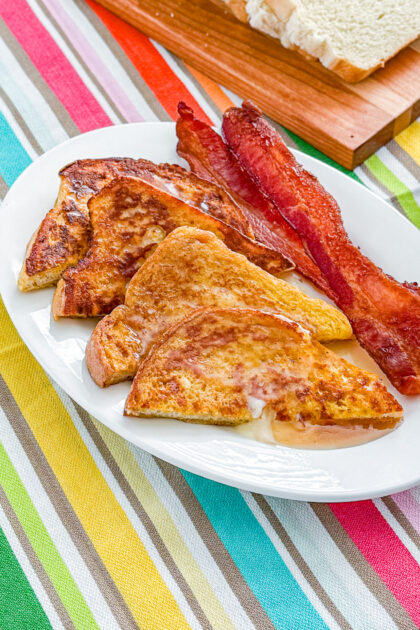 Golden easy blender French toast served warm with syrup