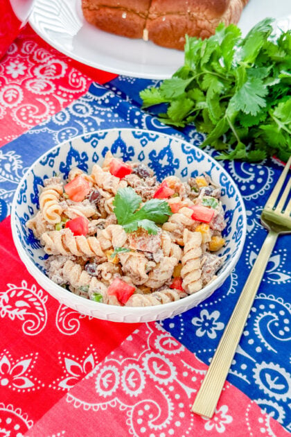 Overhead view of healthy cowboy pasta salad in a large bowl