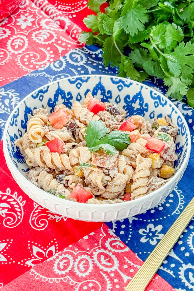 Close-up of healthy cowboy pasta salad with beef, bacon, beans, and corn