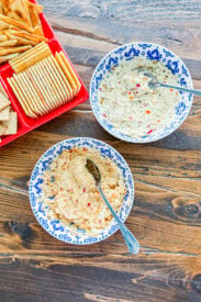 Smoked cream cheese mixed with chopped peppers for serving