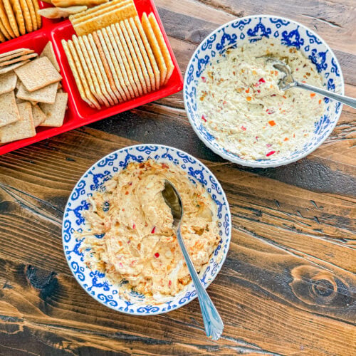 Smoked cream cheese spread mixed with chopped peppers and served with crackers