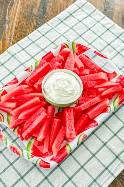 Overhead view of watermelon fries and fluffy dip