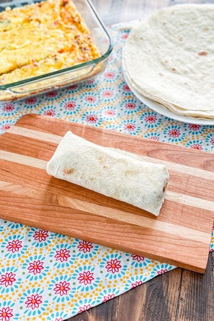 Make-ahead ham and hash brown breakfast burrito wrapped and ready to serve
