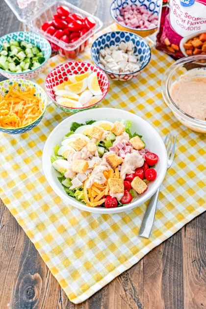 Overhead view of classic chef salad with homemade Thousand Island dressing