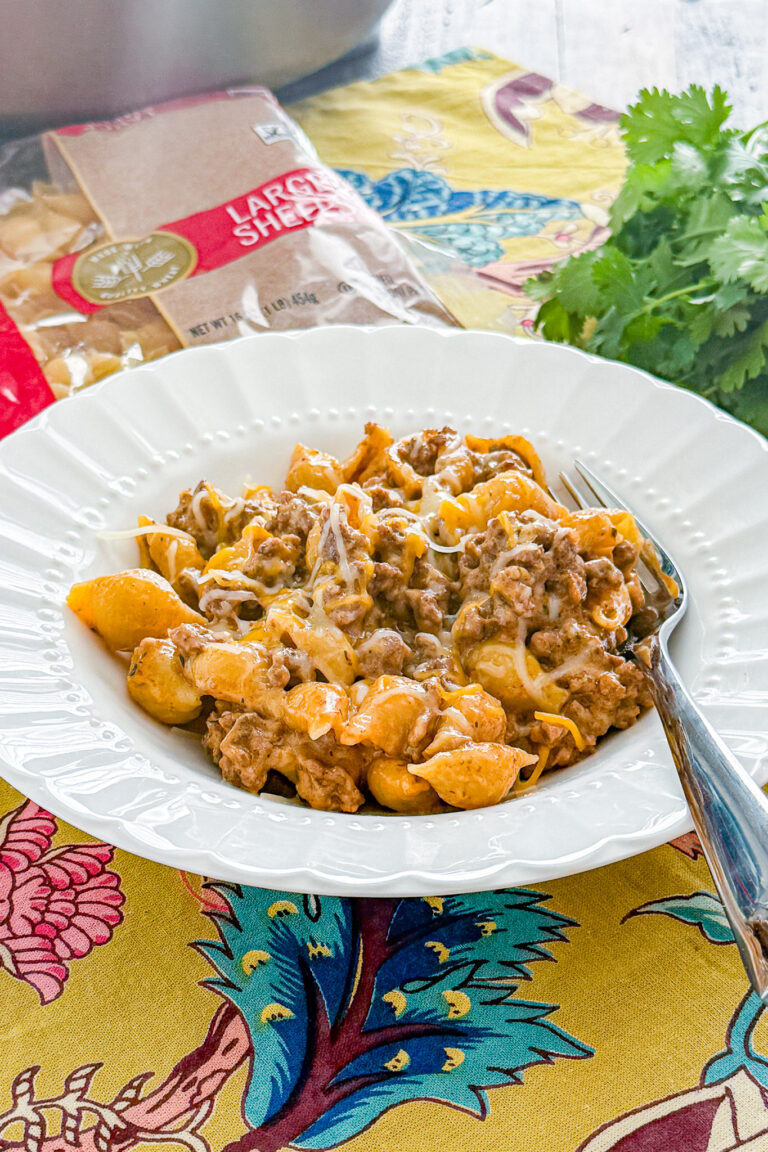 One pot creamy beef and shells with ground beef, cheddar, and Parmesan cheese