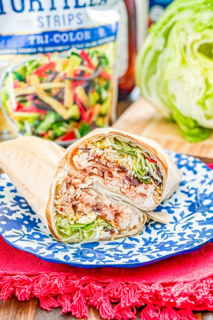 Whiskey River chicken wrap filled with barbecue chicken, lettuce, cheese, tortilla strips, and ranch