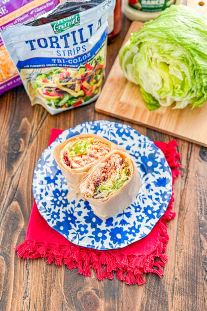 Whiskey River chicken wrap sliced in half to show the barbecue chicken filling