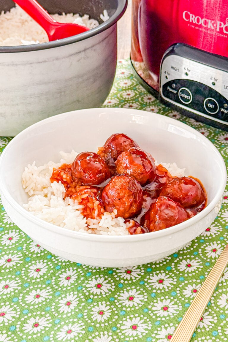 Crockpot cola meatballs coated in a sweet and tangy barbecue sauce