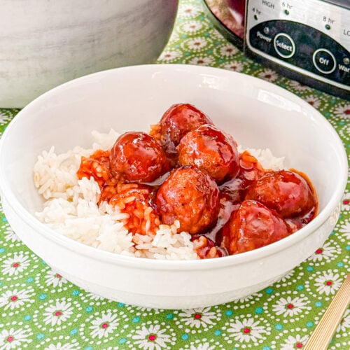 Close-up of barbecue cola meatballs covered in a glossy sauce