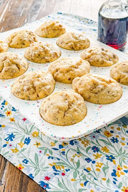 Baked sausage pancake muffins cooling in a muffin pan