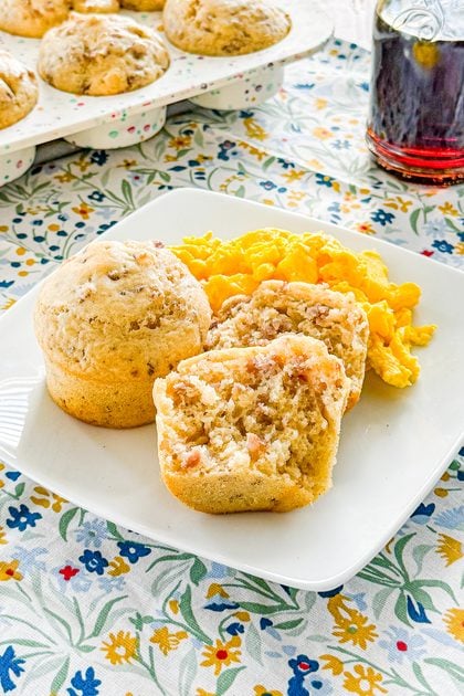 Sausage pancake muffins served with scrambled eggs and syrup