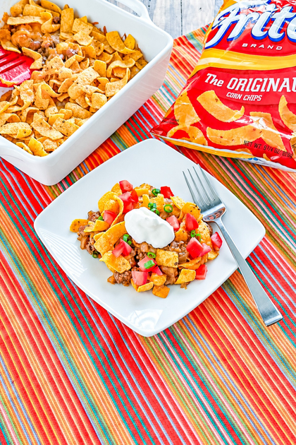 Baked Frito Pie with fresh taco toppings and crunchy Fritos
