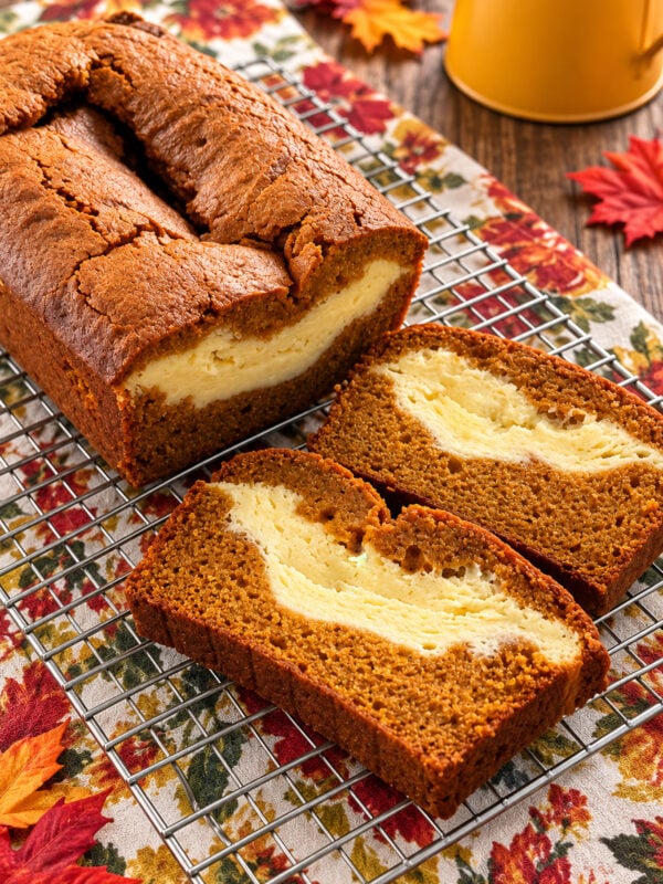 Pumpkin cream cheese bread with a rich cream cheese layer in the center
