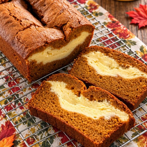 Pumpkin cream cheese bread with a rich cream cheese layer in the center