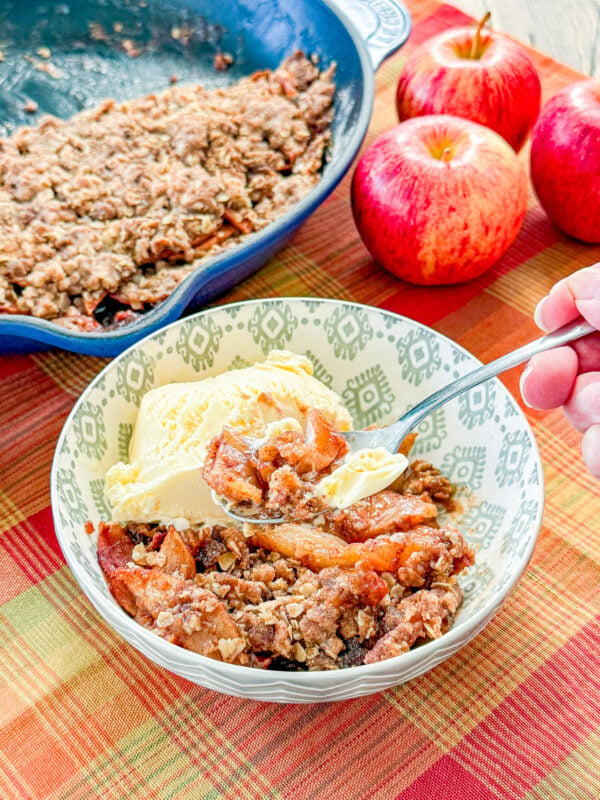 Warm smoked apple crisp served with vanilla ice cream
