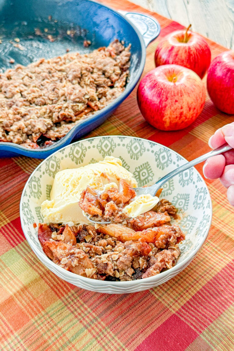 Warm smoked apple crisp served with vanilla ice cream